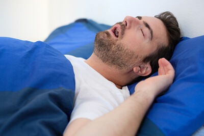 what to do when someone is snoring and you cant sleep