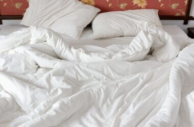 is it bad not to wash your bed sheets?