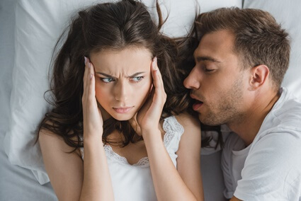 is someone in a deep sleep when snoring?
