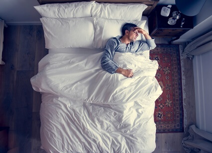 what causes kicking during sleep?