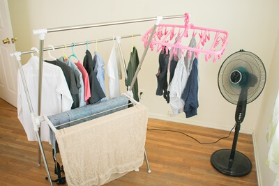 is it bad to sleep with wet clothes drying?