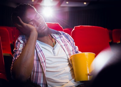 why do I keep falling asleep during movies?