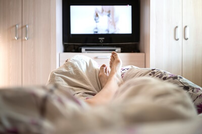 why is it bad to fall asleep with your tv on?