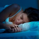 is sleeping in a dark room better for you?