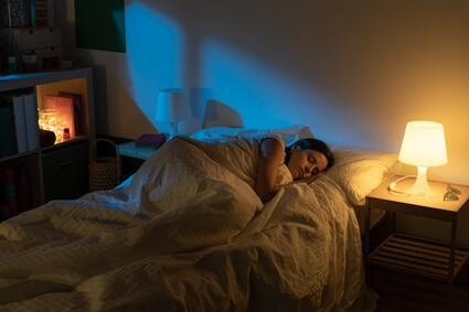 How do I stop clenching my fists while sleeping?