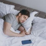 why do i clench my fists at night?