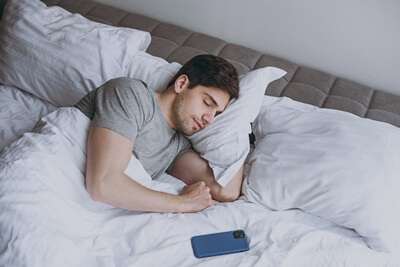 why do i clench my fists at night?